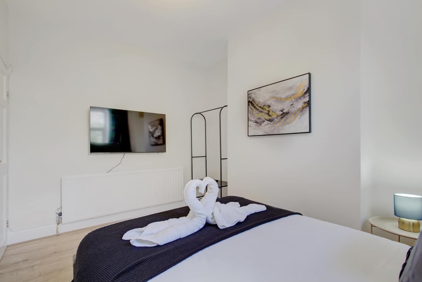 Bedroom one with a double bed